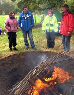 Singing around a peace fire in Wales.